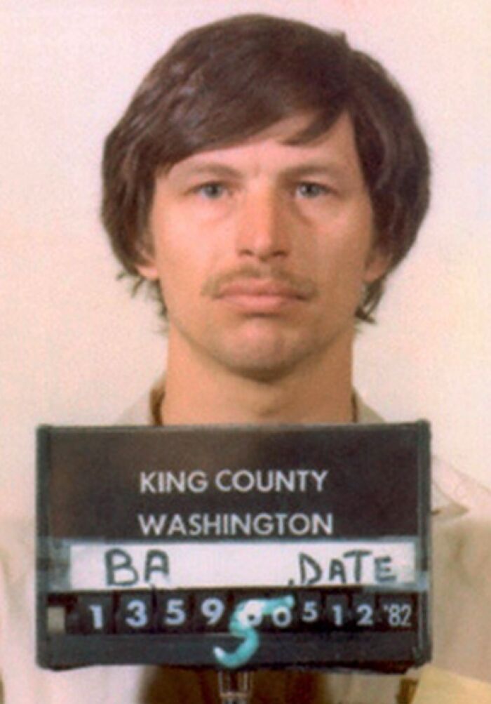 Serial killer mugshot from King County Washington with date board