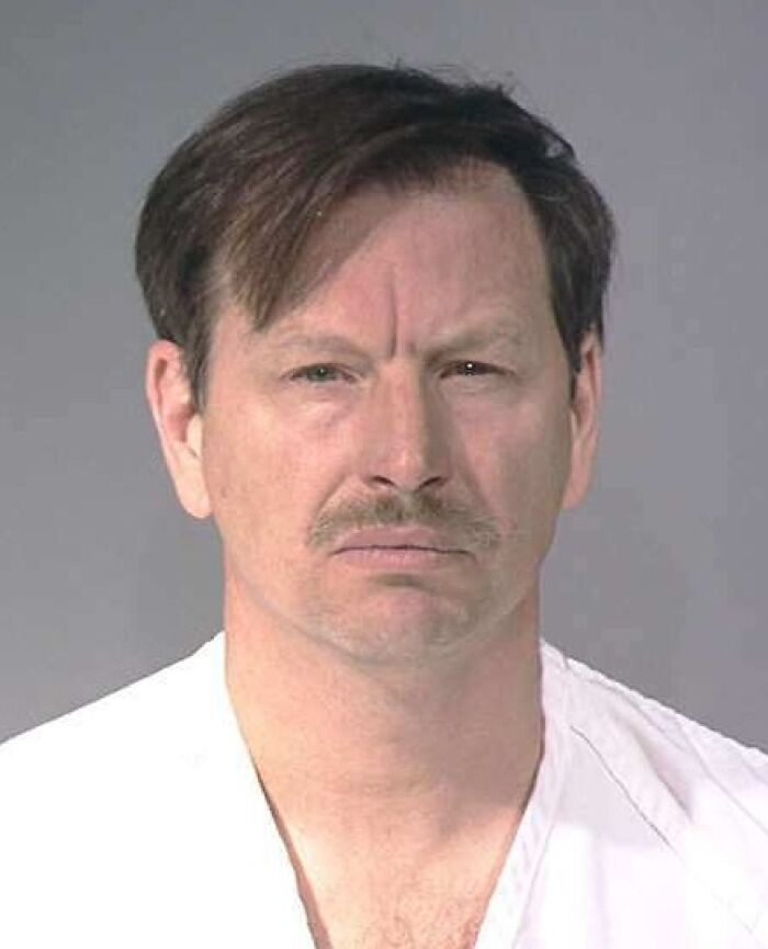 Mugshot of a man related to disturbing serial killer facts