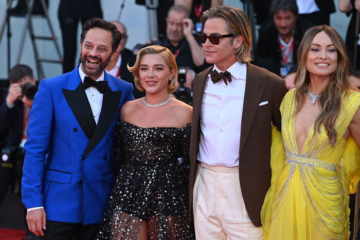 Nick Kroll, Florence Pugh, Chris Pine, and Olivia Wilde on a red carpet for Don't Worry Darling, amid alleged fallout.