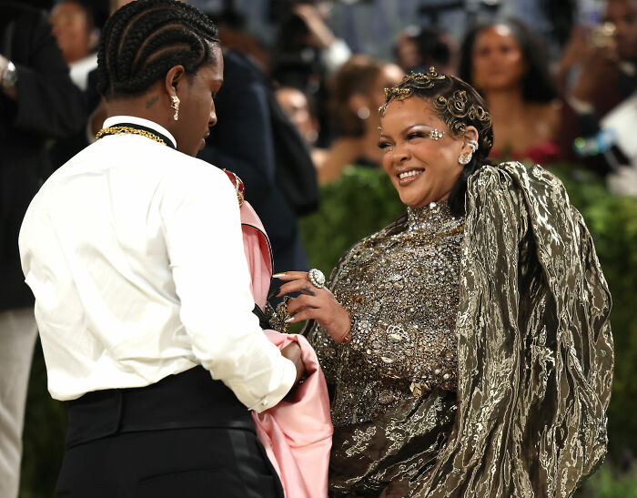 Rihanna's partner, A$AP Rocky, on stage, accused of disrespecting her with a racy comment.