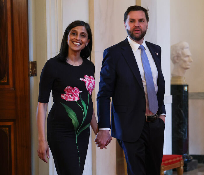 JD Vance and wife Usha holding hands, smiling, amidst ongoing discussions about their marriage. JD Vance and wife Usha holding hands, smiling, amidst ongoing discussions about their marriage.