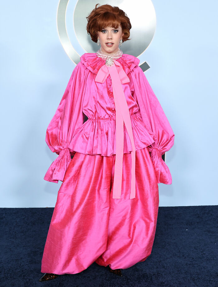 Bright pink oversized satin dress at 2026 Tony Awards red carpet