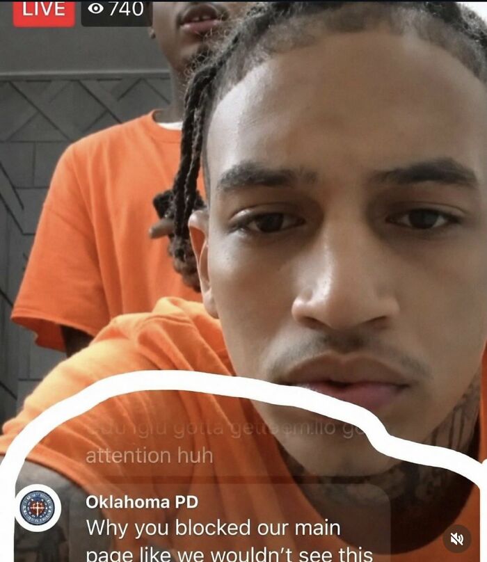 A cringe image of two men live streaming with a comment from Oklahoma PD asking why they were blocked.