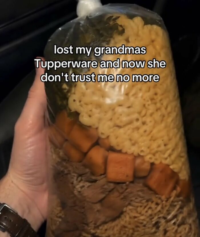 A hand holds a large clear bag filled with various foods including pasta, a cringe sight. The caption mentions losing Tupperware.