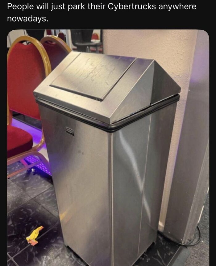 A stainless steel trash can resembling a Tesla Cybertruck, a cringe image that might cause pain.