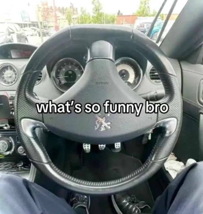 A cringe image showing a car steering wheel that resembles a face, with text asking what is so funny bro.