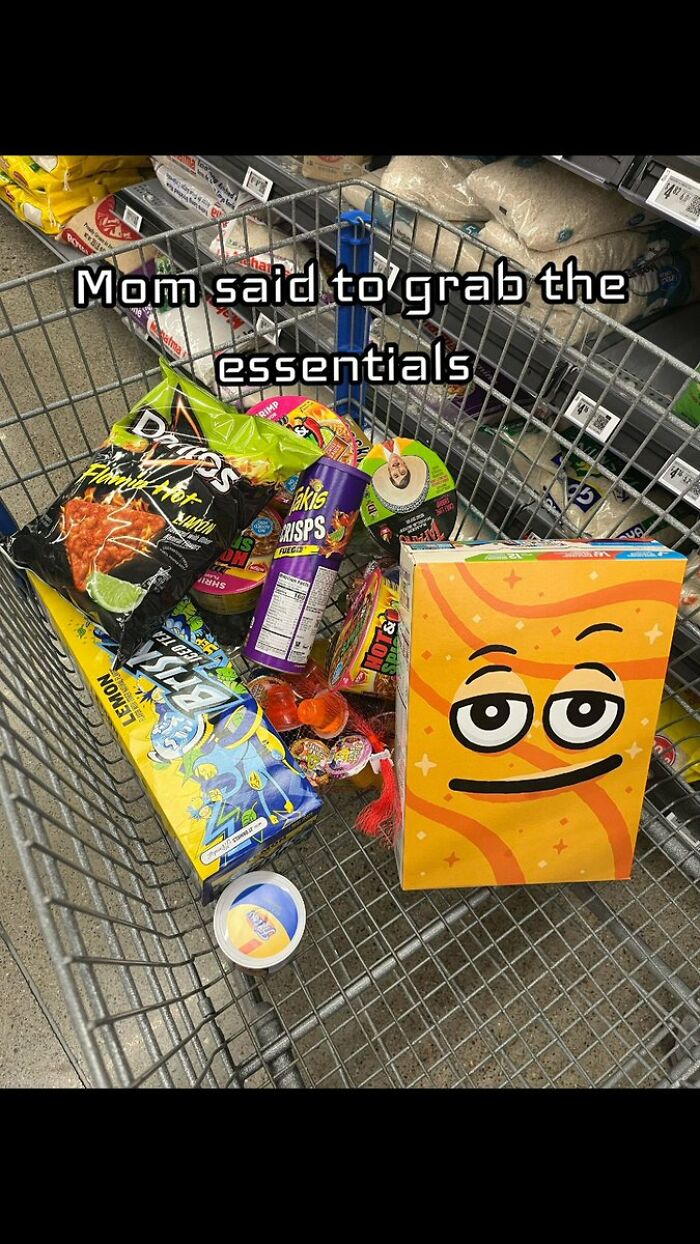 A shopping cart overflowing with cringe snacks like chips and candy, labeled as essentials, which might cause physical pain.
