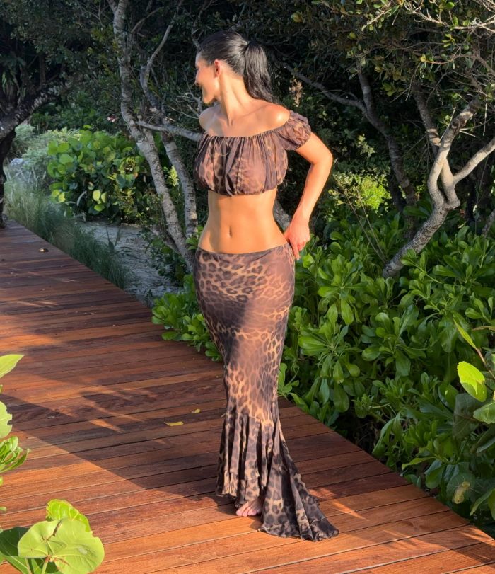 Kylie Jenner in an animal print outfit outdoors, drawing attention to plastic surgery rumors. Kylie Jenner in an animal print outfit outdoors, drawing attention to plastic surgery rumors.