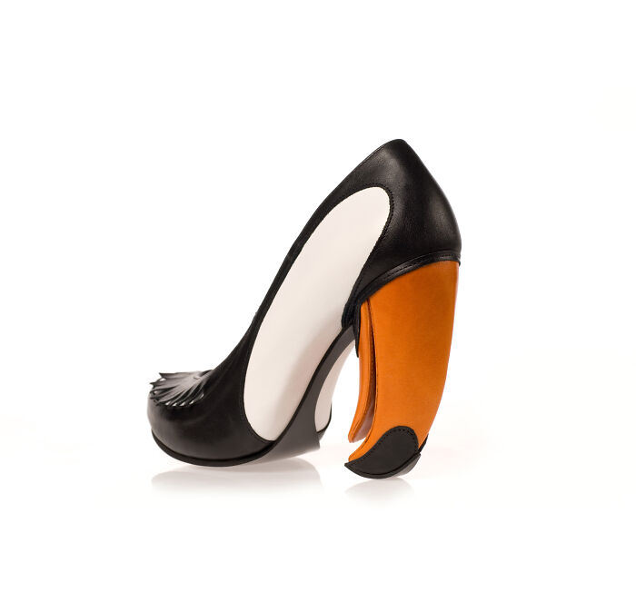 A creative and imaginative Kobi Levi shoe design shaped like a toucan with a large orange beak for the heel.
