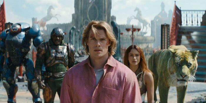 Cast of Masters Of The Universe film with He-Man and Tiger in fantasy setting Cast of Masters Of The Universe film with He-Man and Tiger in fantasy setting