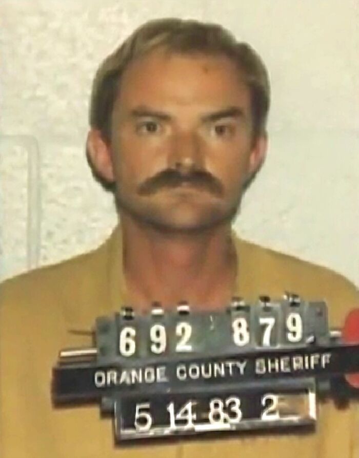 Mugshot of a man with mustache from Orange County Sheriff