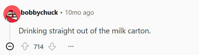 A screenshot of a Reddit comment where a user admits drinking from a milk carton, a disturbing thing single men do.