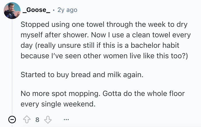 Screenshot of Reddit comment about single men's disturbing habits: using clean towels daily, buying bread/milk, mopping floors weekly.
