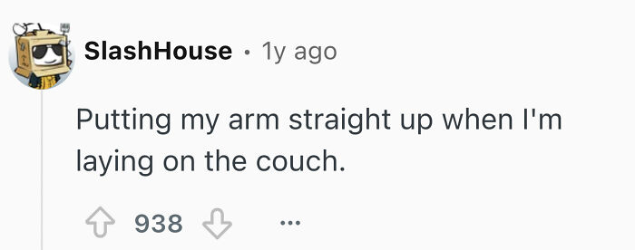 A screenshot of a Reddit comment by user SlashHouse admitting to disturbing things single men do: putting an arm straight up while laying on the couch.