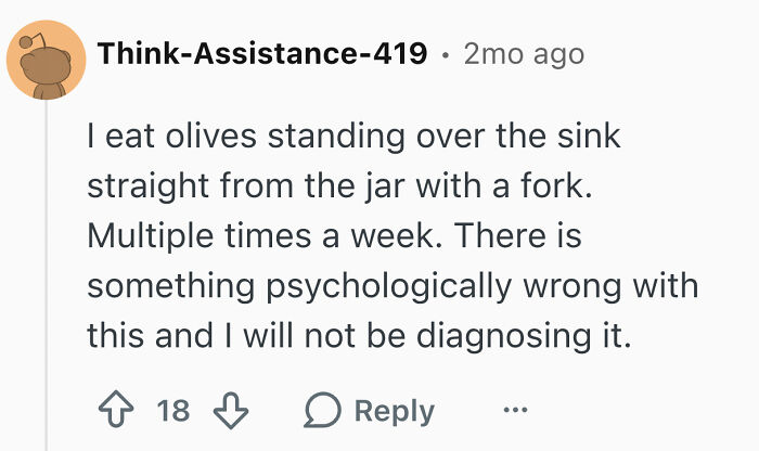 A Reddit comment about single men doing disturbing things while living alone, specifically eating olives over the sink from the jar.
