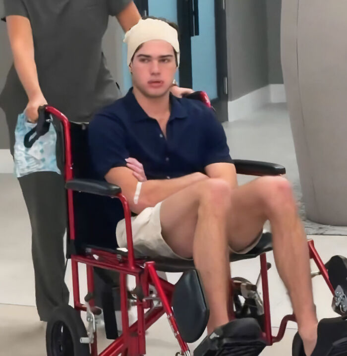 Looksmaxxer Clavicular in wheelchair post third surgery