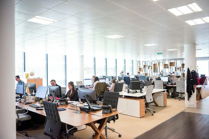 Modern open office workspace with employees about mass walkouts