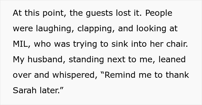Wedding guests laugh and clap while the MIL tries to sink into her chair.