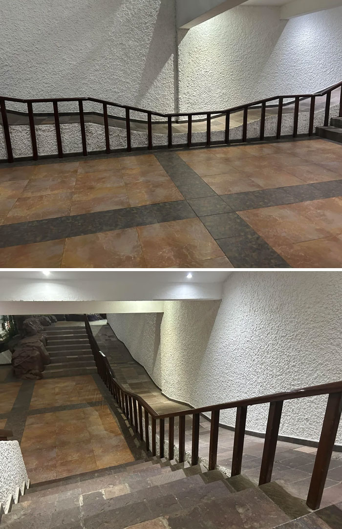 Awkwardly designed stair ramp with uneven angles and low railing as a design fail