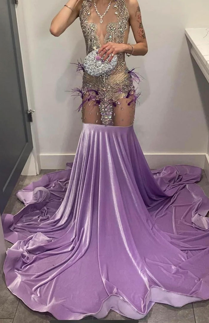 Fashion design fail with sheer dress and awkward embellishments