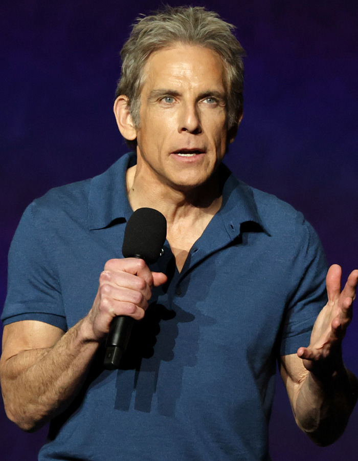 Ben Stiller speaking with microphone on stage Ben Stiller speaking with microphone on stage