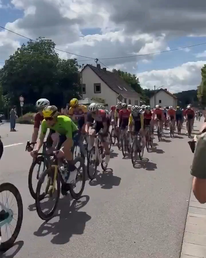 Bike Race Descends Into Chaos After Elderly Woman Charges Into Course On Mobility Scooter, Prompts Mass Crash Bike Race Descends Into Chaos After Elderly Woman Charges Into Course On Mobility Scooter, Prompts Mass Crash