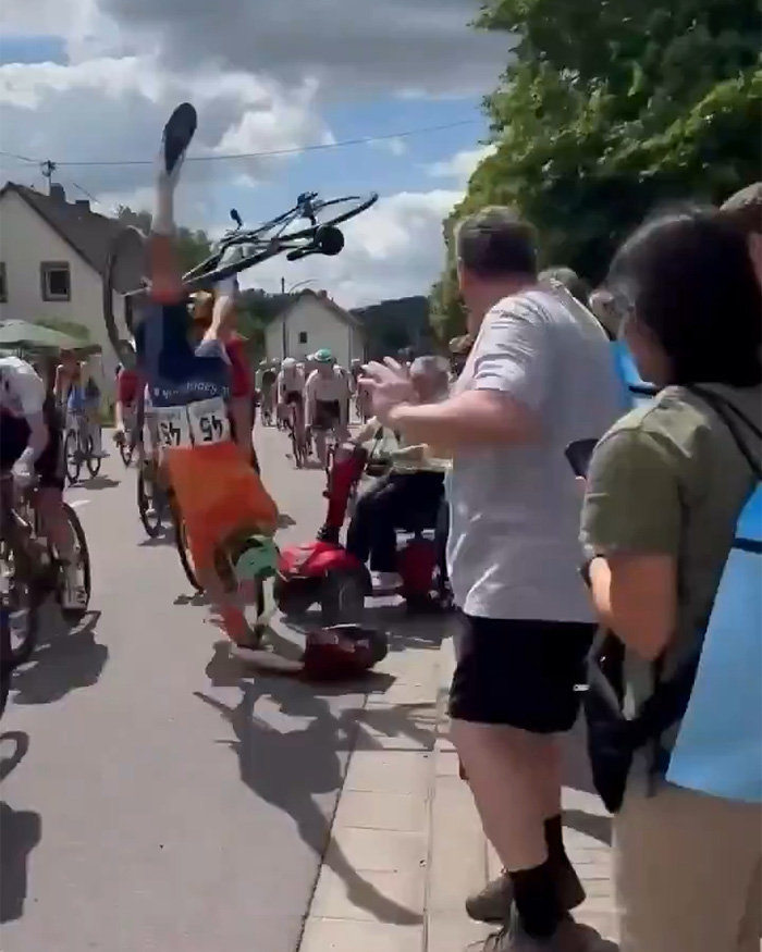 Bike Race Descends Into Chaos After Elderly Woman Charges Into Course On Mobility Scooter, Prompts Mass Crash Bike Race Descends Into Chaos After Elderly Woman Charges Into Course On Mobility Scooter, Prompts Mass Crash