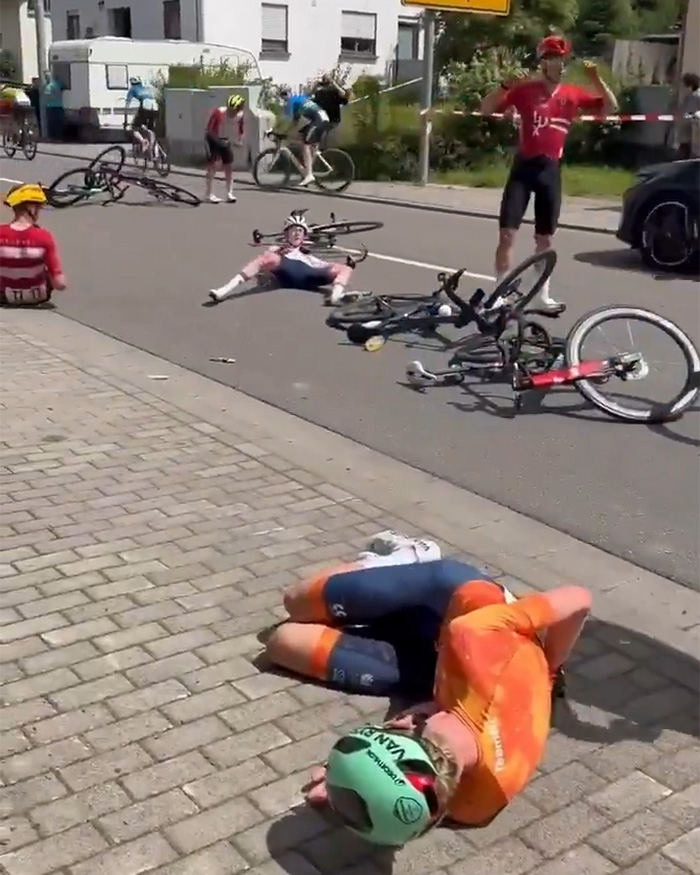 Bike Race Descends Into Chaos After Elderly Woman Charges Into Course On Mobility Scooter, Prompts Mass Crash Bike Race Descends Into Chaos After Elderly Woman Charges Into Course On Mobility Scooter, Prompts Mass Crash