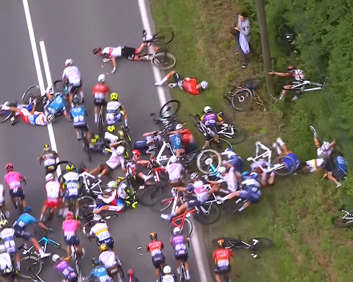 Bike Race Descends Into Chaos After Elderly Woman Charges Into Course On Mobility Scooter, Prompts Mass Crash Bike Race Descends Into Chaos After Elderly Woman Charges Into Course On Mobility Scooter, Prompts Mass Crash