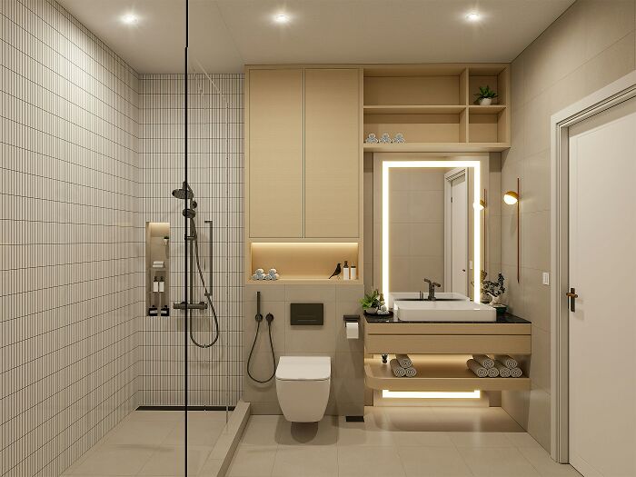 Modern bathroom with illuminated mirror and tiled shower