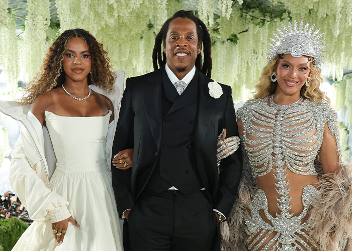 Beyonc&eacute; and Kim Kardashian's parenting styles are highlighted with Blue Ivy and her parents Jay-Z and Beyonc&eacute; in elegant attire.