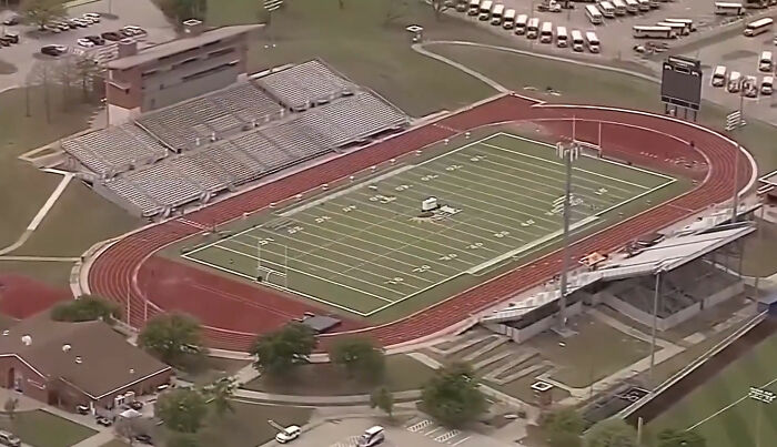 Aerial view of a football field and stadium related to Karmelo Anthony's case