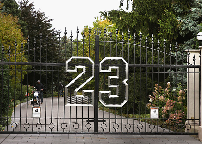 An elaborate gate with the number 23, belonging to a celeb whose home renovations might have devalued their property. An elaborate gate with the number 23, belonging to a celeb whose home renovations might have devalued their property.