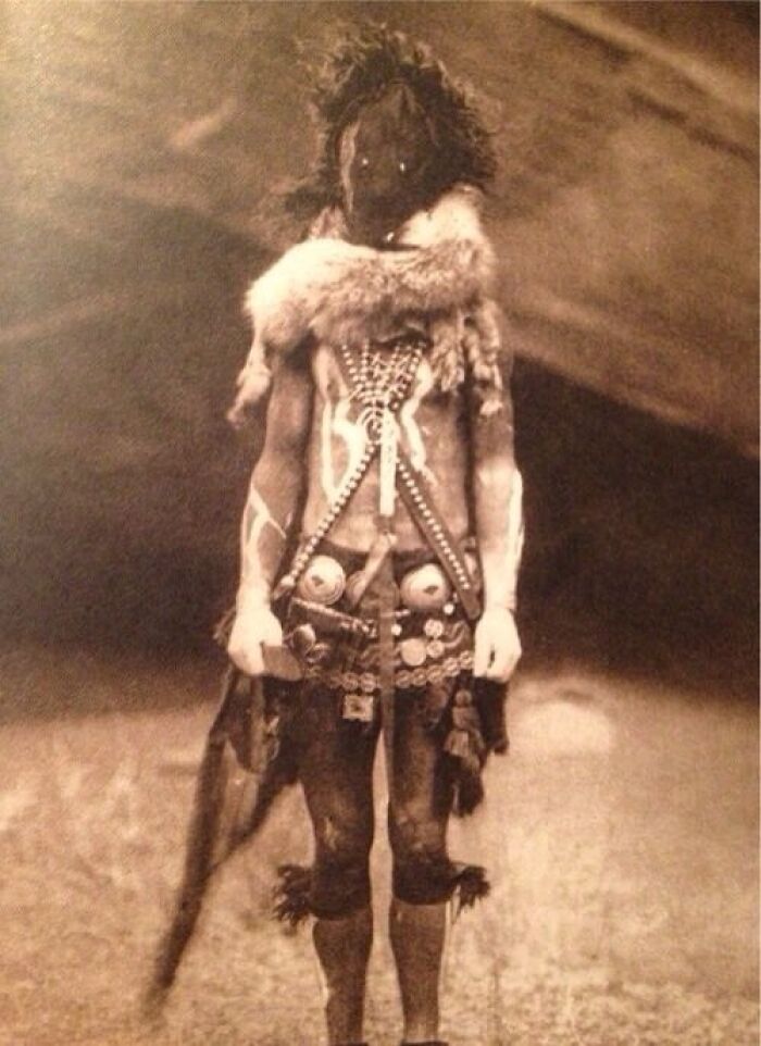 A person in traditional clothing, a historical photo that feels impossible to explain.