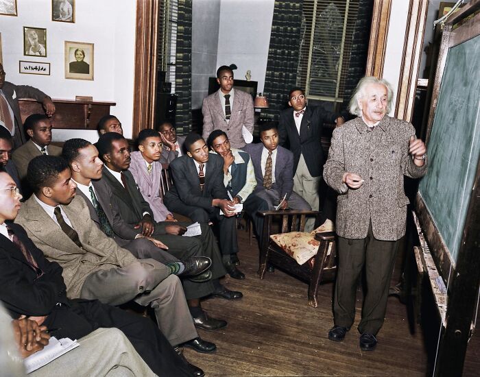 Albert Einstein teaching a class of young men, one of the historical photos.