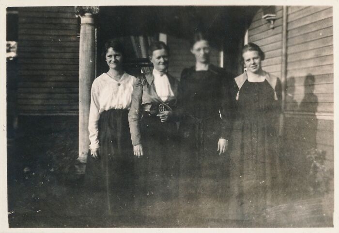 Four women stand on a porch, captured in one of several historical photos.