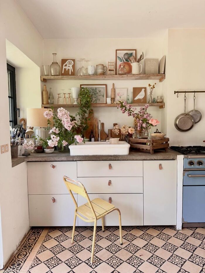 Rustic kitchen interior design with floral decor and patterned floor