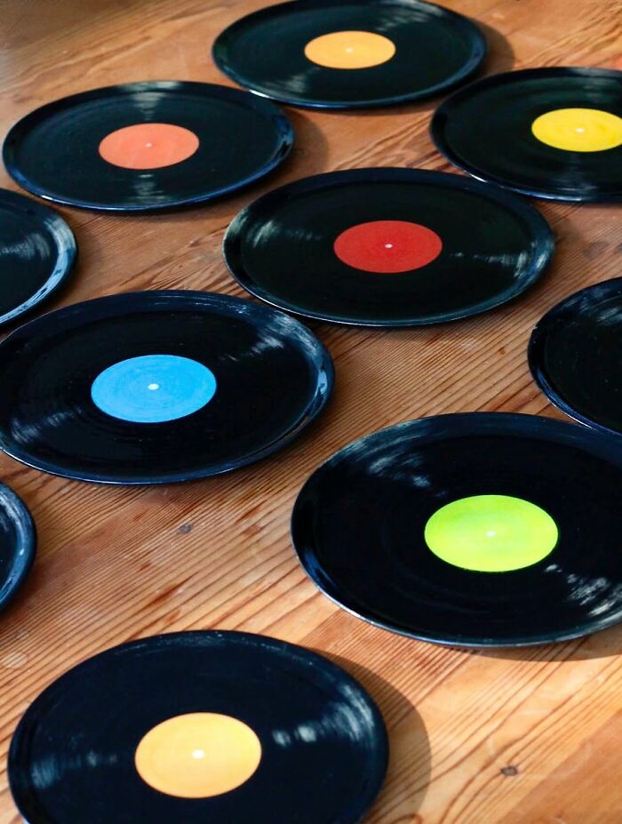 Vinyl record plates decor on wooden floor for cool interior design ideas