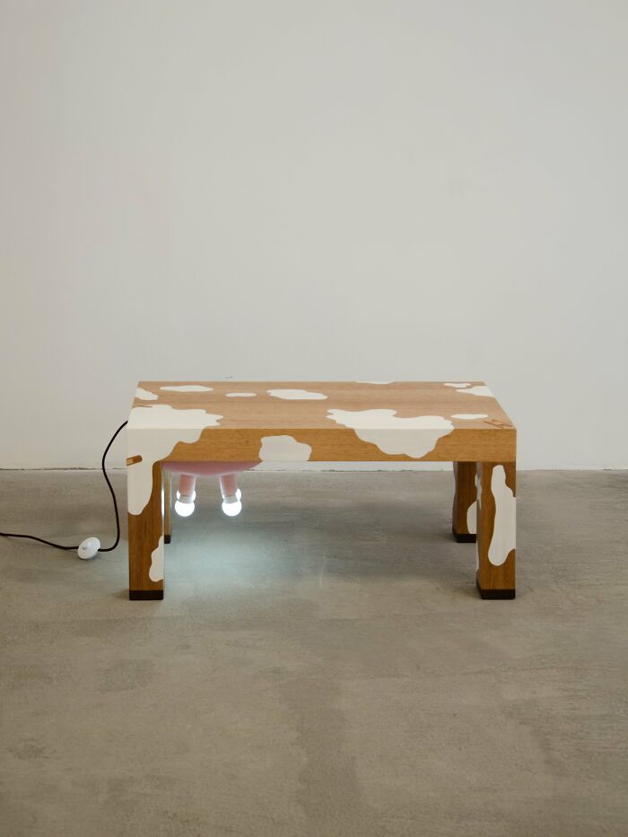 Modern interior design table with unique cow pattern and integrated lights