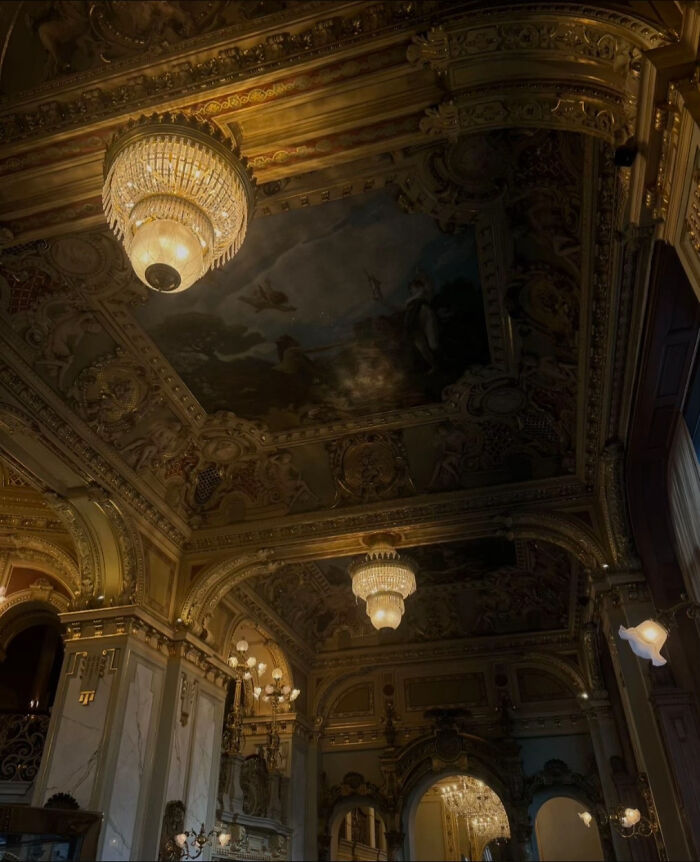 Aesthetic ornate ceiling with chandeliers and intricate architectural details