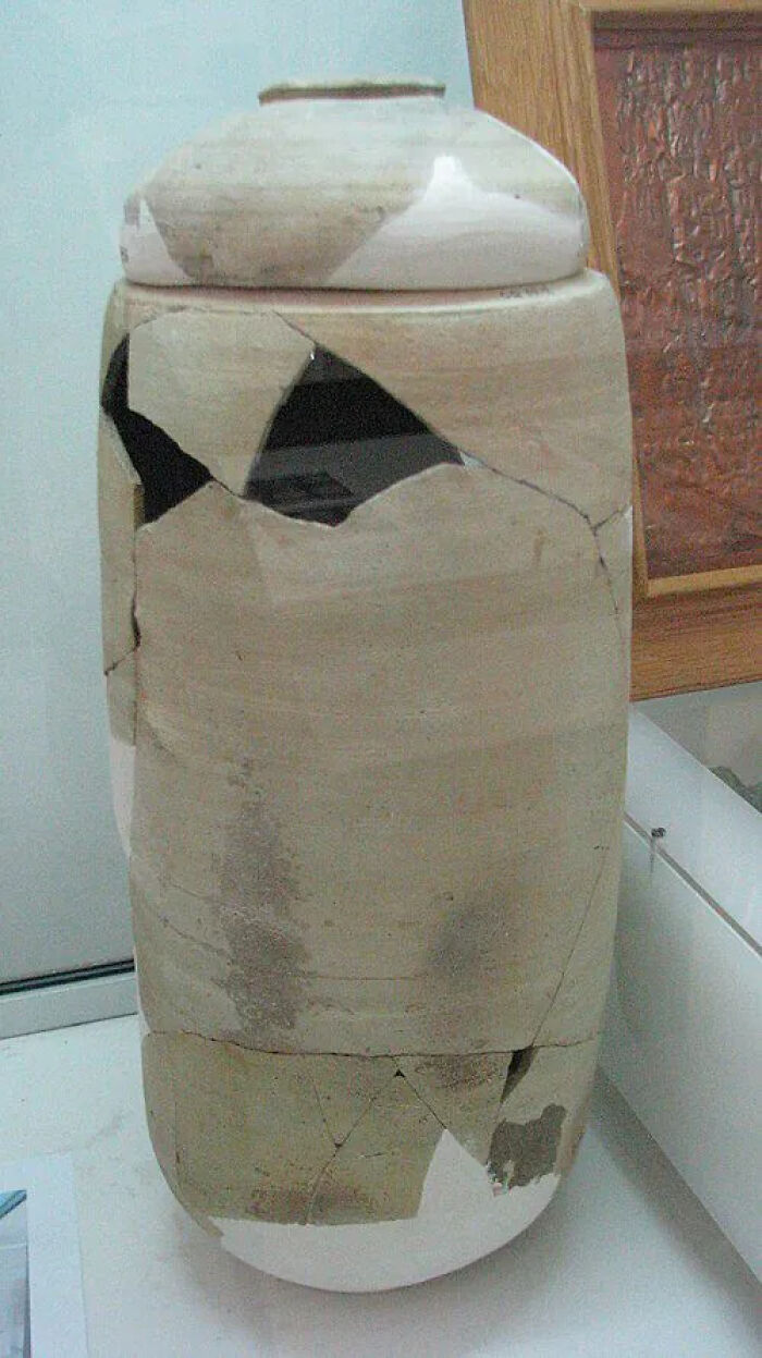 A fragmented ceramic jar, an ancient lost treasure revealing glimpses of the past.