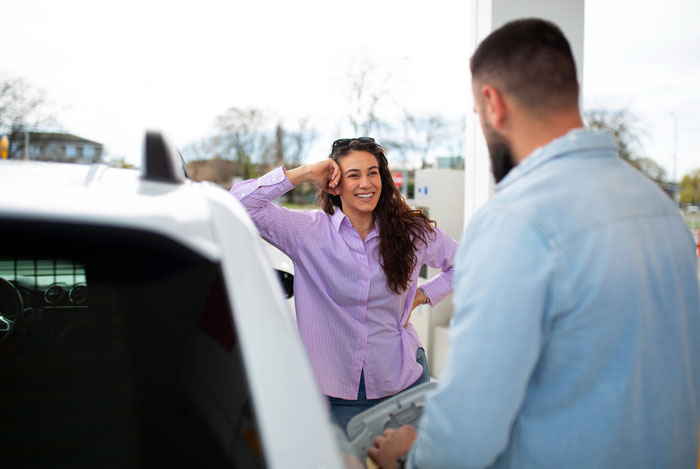 Wife's creepy friend flirts with hubby, plotting to steal him away at a gas station.