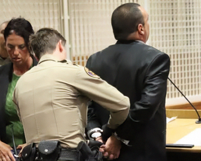 A dad being handcuffed in court after his sentence for a disturbing relationship with his daughter sparked outrage.