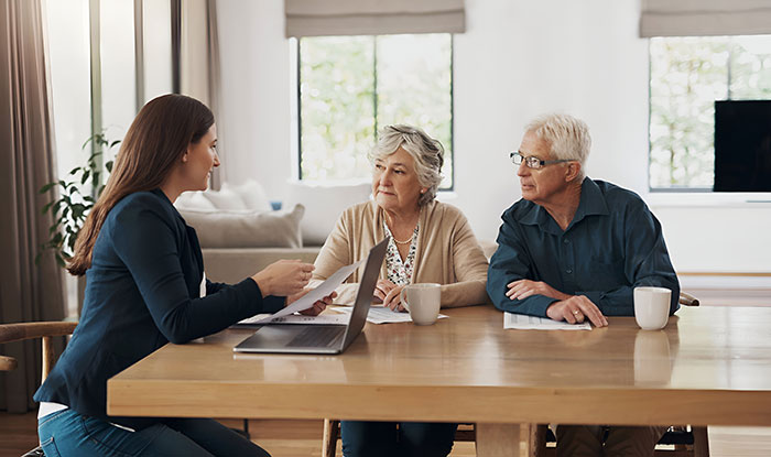 A young woman discusses financial matters with older parents, fueling the daughter's feeling that her frugal life is disrespected. A young woman discusses financial matters with older parents, fueling the daughter's feeling that her frugal life is disrespected.