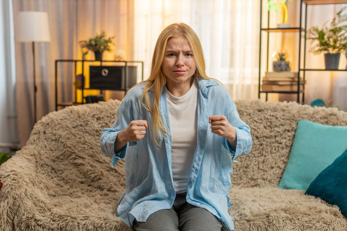 Angry woman expressing frustration possibly over prenuptial disagreement Angry woman expressing frustration possibly over prenuptial disagreement
