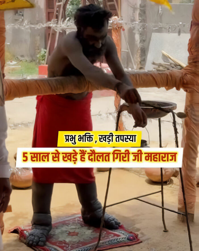 Man standing for over 5 years in an extreme act of devotion, holding onto a support structure. Man standing for over 5 years in an extreme act of devotion, holding onto a support structure.