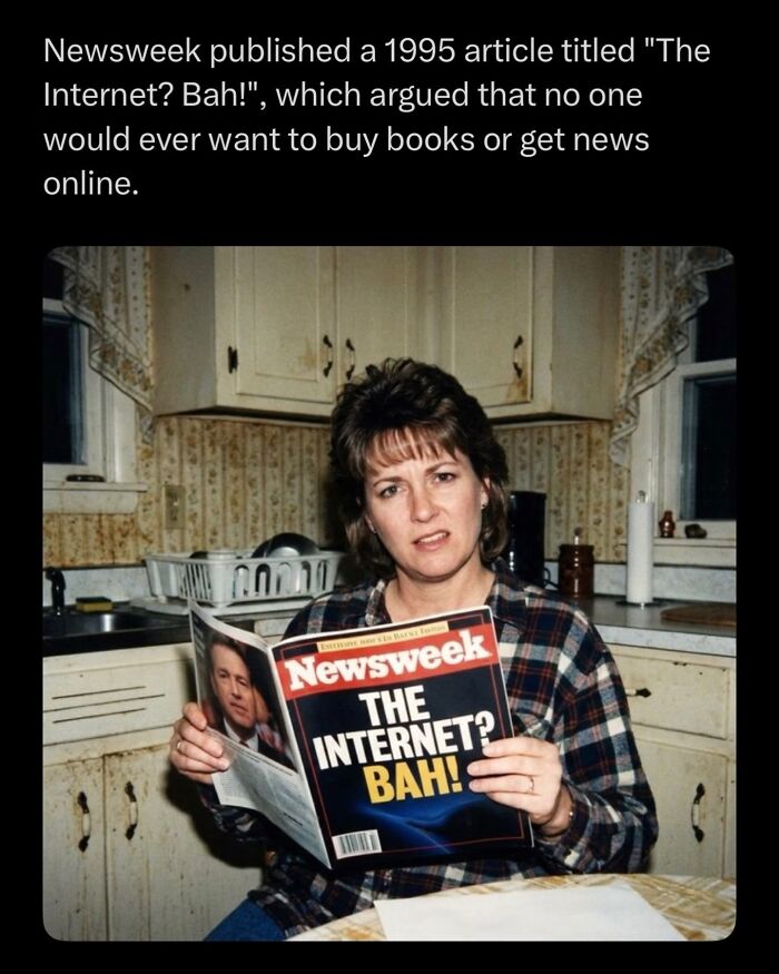 Woman holding Newsweek magazine with skeptical internet headline