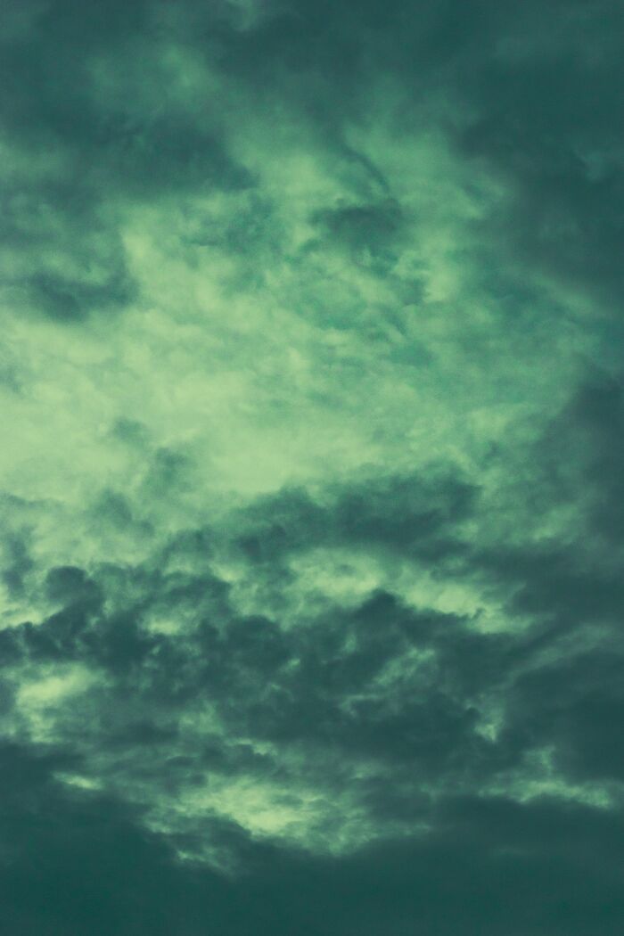 Dark ominous storm clouds signaling natural danger and gut instincts