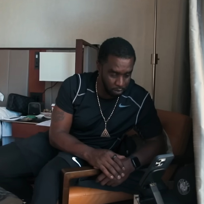 Diddy looking somber, possibly contemplating the troubling history with the Lilo & Stitch actress.