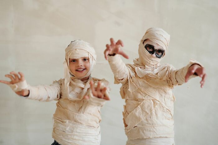 Kids dressed as mummies for Halloween brain facts